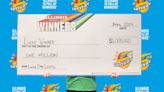 Illinois woman wins $1 million after gas station customer gives her a lottery ticket