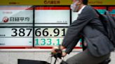 Stock market today: Asian shares are mixed after US holiday quiet