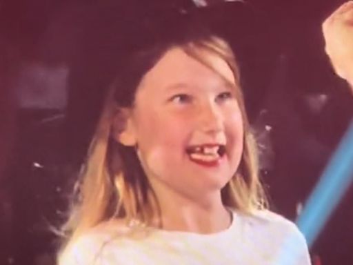 Adorable moment Taylor Swift gifts '22 hat' to young girl