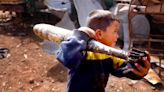 Why kids risk getting buried alive by trash in Syria's 'Valley of Death'