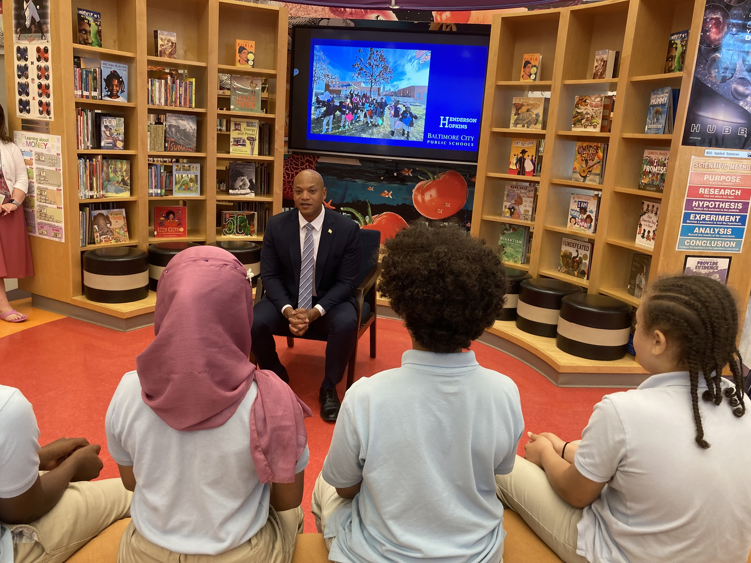 Maryland Gov. Wes Moore signs executive order on climate change and heat pumps at Baltimore elementary school