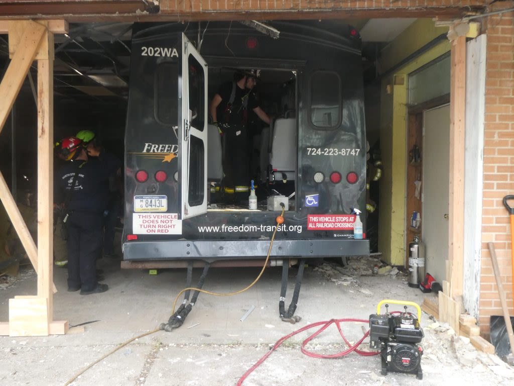 Freedom Transit bus crashes into storage building in Charleroi