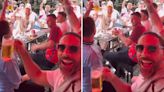 Watch Rio Ferdinand get on the beers with rowdy England fans for Slovakia clash