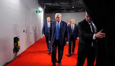 The stepped-up security around Trump is apparent, with agents walling him off from RNC crowds | ABC6