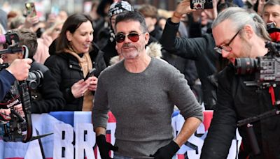 Simon Cowell sends cheeky message to Amanda Holden after Sharon Osbourne clash