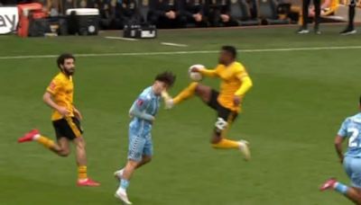 Stunned fans ask ‘how is he still on the pitch?’ as Wolves star Semedo escapes red card after flying kick to face