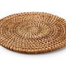 Placemats made from woven bamboo strips, providing a natural and earthy look to table settings. Lightweight and suitable for both indoor and outdoor use.