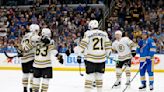 Marchand scores twice, passing 900 career points, as Boston beats St. Louis 4-3 in OT