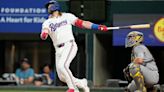 Texas Rangers rookie Davis Wendzel records his first major league hit against Seattle