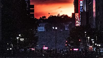 Manhattanhenge creates a dramatic sunset over 42nd St. in Manhattan