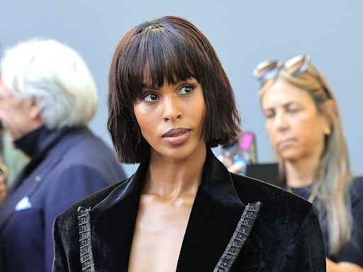 Braless Sabrina Elba sets pulses racing in black jacket during PFW