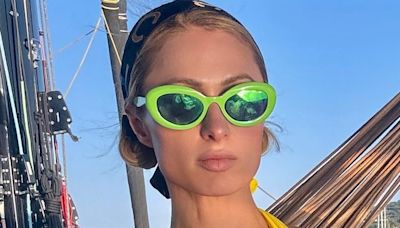 Paris Hilton sizzles in yellow bikini during family yacht trip