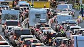 Travel chaos grips UK: Queues build as 3.6million cars hit the road