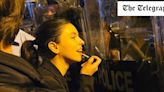 Lipstick protester vows to keep fighting Russian influence despite intimidation and violence