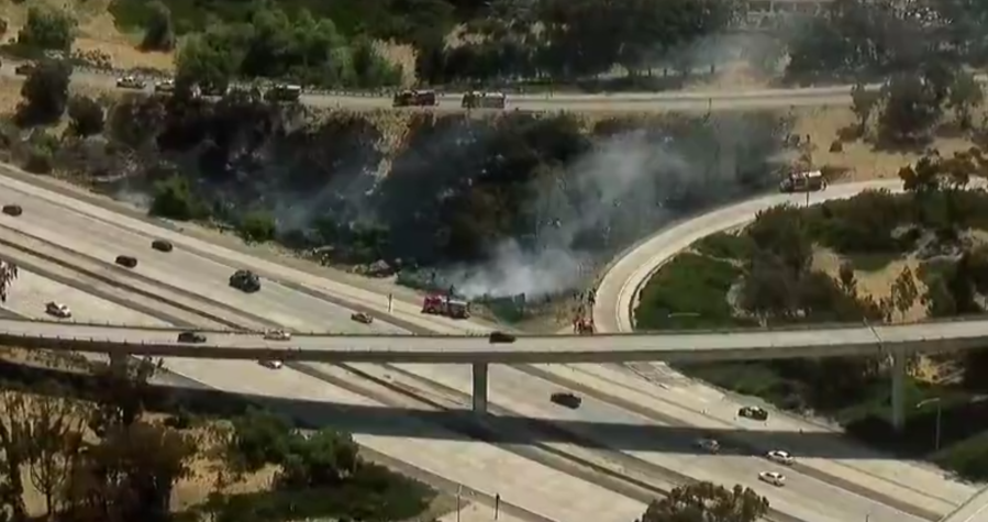 Firefighters shutting down I-805, SR-905 ramps due to vegetation fire