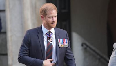 Prince Harry celebrates Invictus Games anniversary as King hosts garden party a few miles away