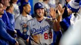 Dodgers trade Michael Busch, Yency Almonte; avoid arbitration with Walker Buehler