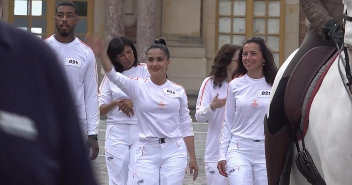 Movie star Salma Hayek Pinault and singer Patrick Bruen join Olympic torch relay at Chateau de Versailles