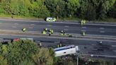 Girl, 15, and driver killed in M53 crash after school bus overturns