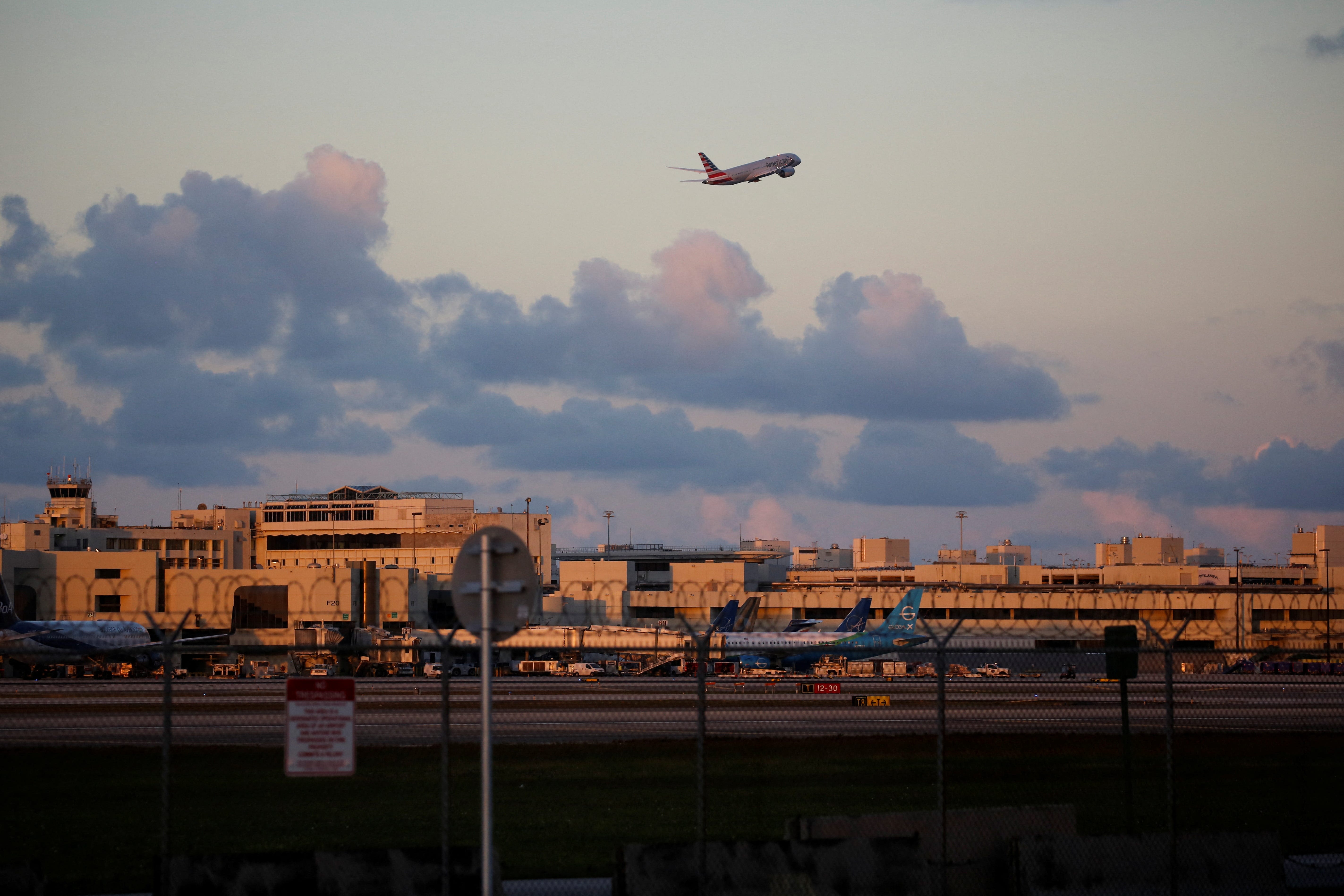 Miami airport stabbing: Woman stabbed, almost thrown off fourth-floor railing