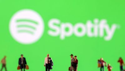 Spotify reports record quarterly earnings, shares jump 14% in premarket trade