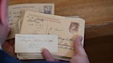 Granddaughter of German soldier returns looted postcards