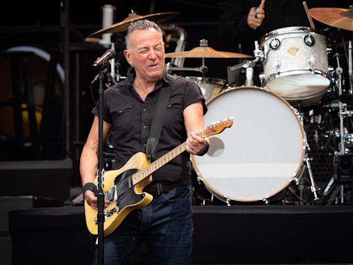 What time is Bruce Springsteen performing on stage at London's Wembley Stadium?