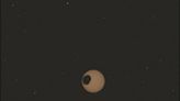 Solar eclipse on Mars shows the planet partially covered in darkness in new NASA images