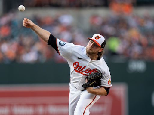 Burnes shackles Rangers over 7 innings and Orioles hit 4 HRs in 11-2 rout of defending champs