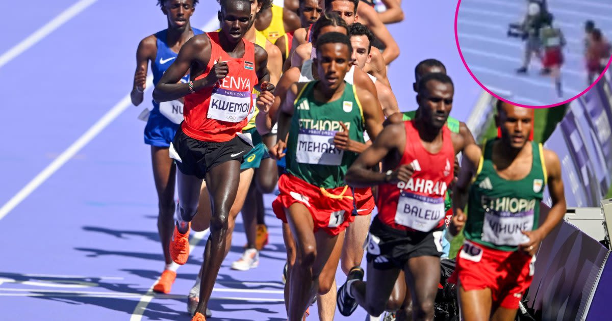 Chaos at 5000m Heats With 4-Man Pile Up, Cameraman on the Track