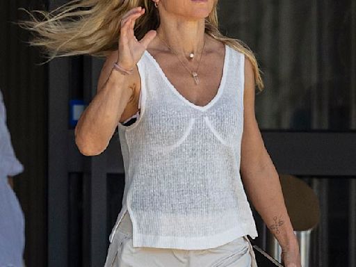 Elsa Pataky puts on a leggy display in an athletic white mini skirt