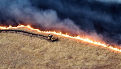 California firefighters battle Corral wildfire east of San Francisco; hot conditions ahead