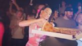 Katy Perry Throws Pizza to her Fans During a Nightclub Appearance