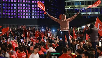 Delighted Turkey fans celebrate victory over Austria across Europe