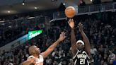 Jrue Holiday's late steal against Devin Booker leads Bucks to 104-101 victory over Suns