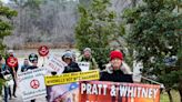 As Pratt & Whitney facility nears completion, protest group looks to the future