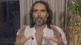 Russell Brand admits ‘distressing week’ and floats media conspiracy over sex assault allegations