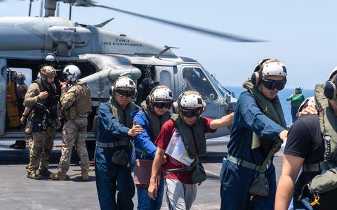 US Navy rescues crew from merchant vessel attacked by Houthi rebels in Red Sea