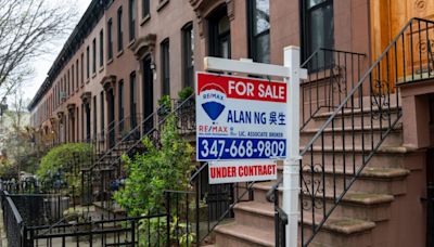 U.S. home prices hit a record high as sales fell. Here’s how housing experts explain the trends