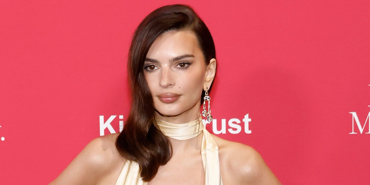 EmRata's plunging gold gown is best described as melted butter