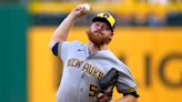 Brandon Woodruff pitches seven scoreless innings to lift NL Central-leading Brewers over Pirates 7-3