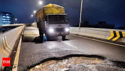 Opened just a year ago, potholes crop up on Mumbai's Santacruz-Chembur Link Road extension | Mumbai News - Times of India