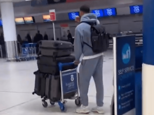 Rangers star Connor Goldson spotted leaving Scotland with four suitcases