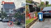 BMW owner uses safety cone with LTA logo to chope parking space next to hydrant in Bedok private estate