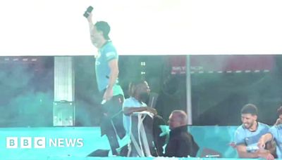 Jack Grealish almost falls off bus at Manchester City parade