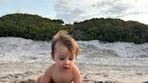 Video shows crawling baby on beach watching baby sea turtles crawl to ocean in Florida