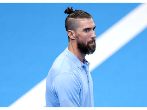 Michael Phelps' 'Silly' Man Bun Causes Waves as He Watches Simone Biles Compete