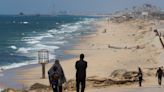Aid trucks begin moving ashore via U.S. Gaza pier