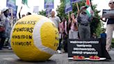 Pro-Palestinian protesters demonstrate against Wimbledon sponsor