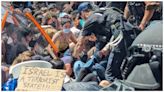 Riot police drag away protesters at University of Texas as Gaza tensions flare